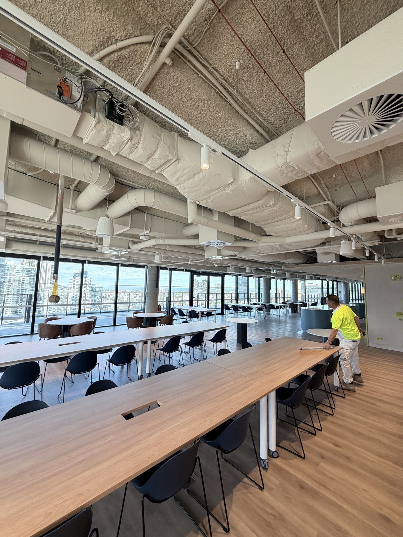 Exposed ceiling services finished in white